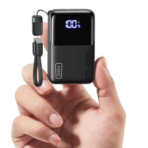 A hand holding a INIU Mini Portable Charger