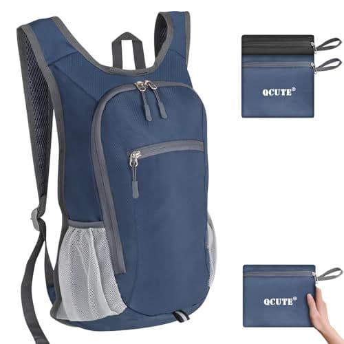 Navy blue lightweight packable backpack with mesh side pocket, shown next to two small folded pouches that the bag collapses into for storage.