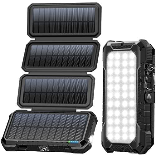 Black solar power bank with four fold-out solar panels and built-in LED panel light